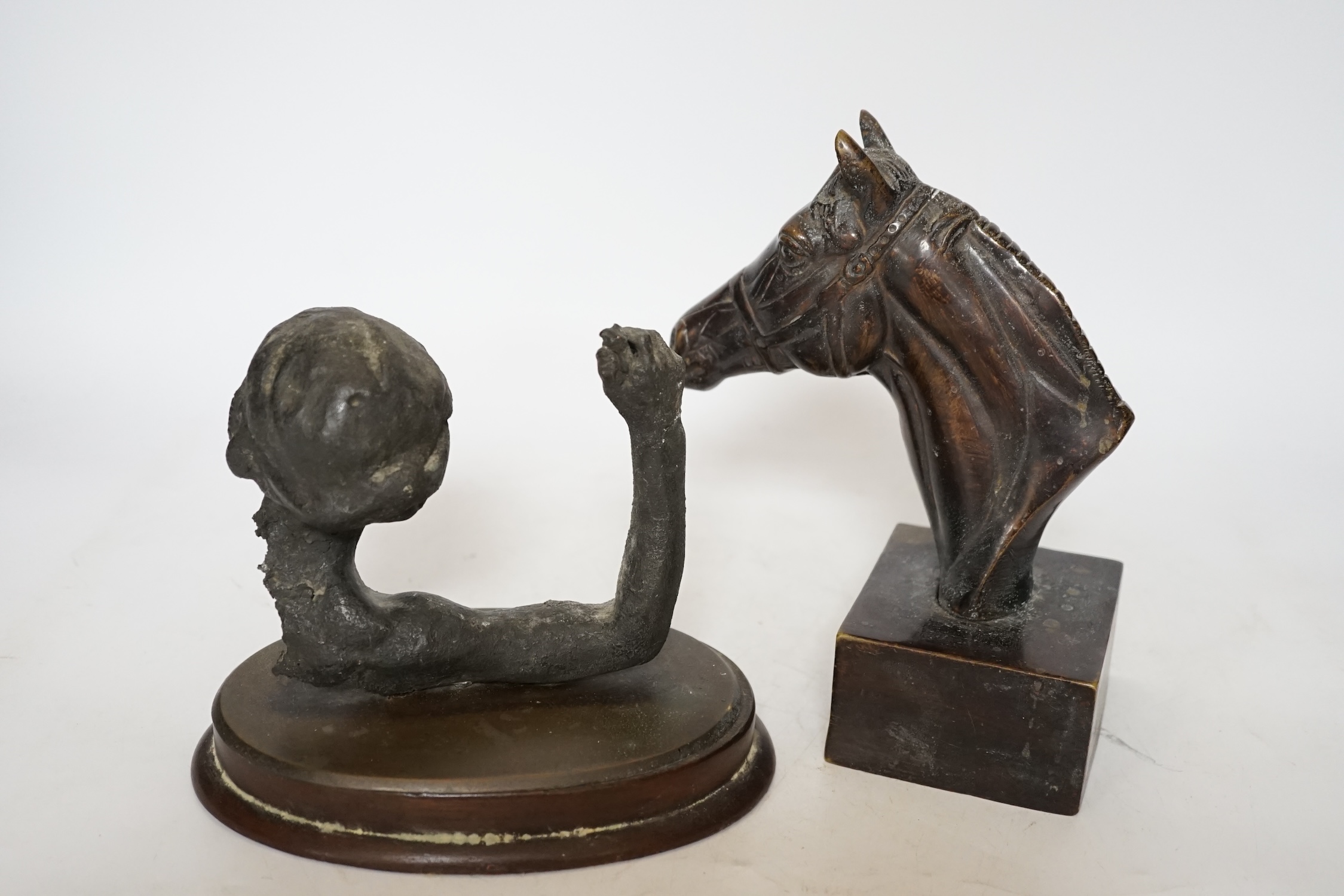 A decorative bronze study of a horse head and a spelter figural fragment, tallest 18.5cm